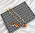 Adorn yourself with a touch of tradition in an exclusive pearl and Meenakari jewellery set!