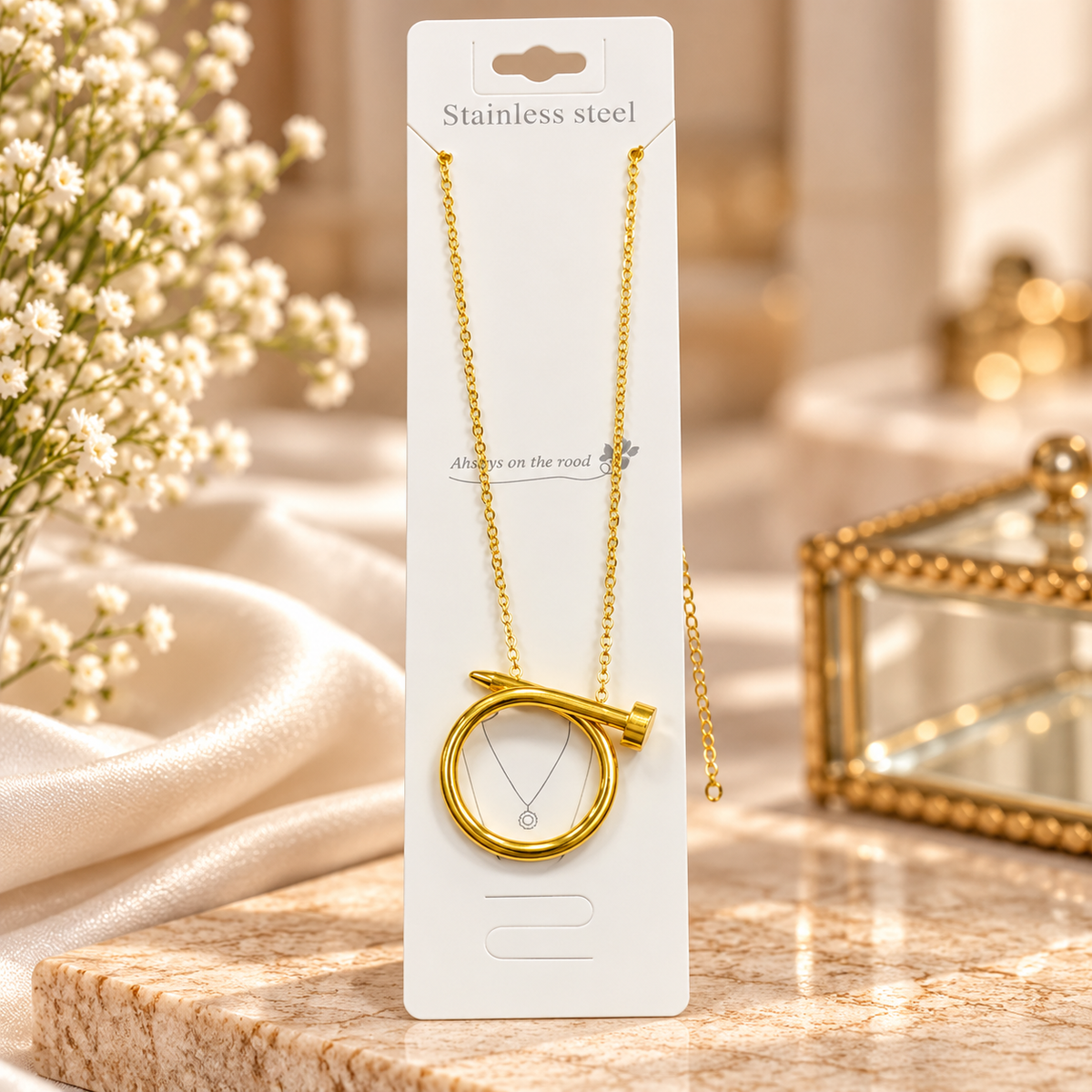An iconic 'Nail Motif' pendant chain to add a bold and gorgeous style to your outfit!