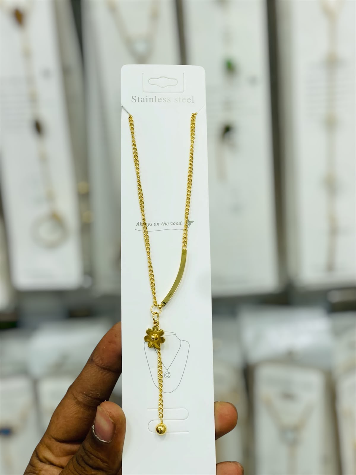 A minimalist floral Y-necklace to add a unique and stylish vibe to your outfit!